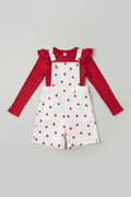Adorable girls 2-piece suspender shorts set featuring a red ribbed ruffle top and white heart-print overalls. Perfect for Valentine's Day, parties, family photos, and everyday boutique style.