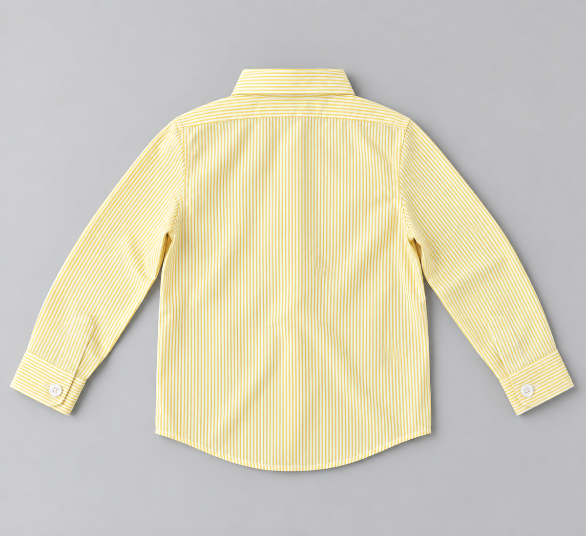 Back view of boys yellow and white striped long-sleeve button-up shirt with buttoned cuffs