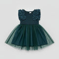 Baby girl forest green ruffle tulle dress with a soft ribbed bodice, layered tulle skirt, and elegant boutique design. Perfect for birthdays, weddings, holidays, family photos, and special occasions.