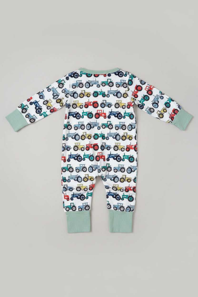 Back side of a soft baby tractor print zip-up sleeper featuring a full-length zipper, long sleeves, and comfortable ribbed cuffs. Perfect for sleeping, playing, and everyday adventures.