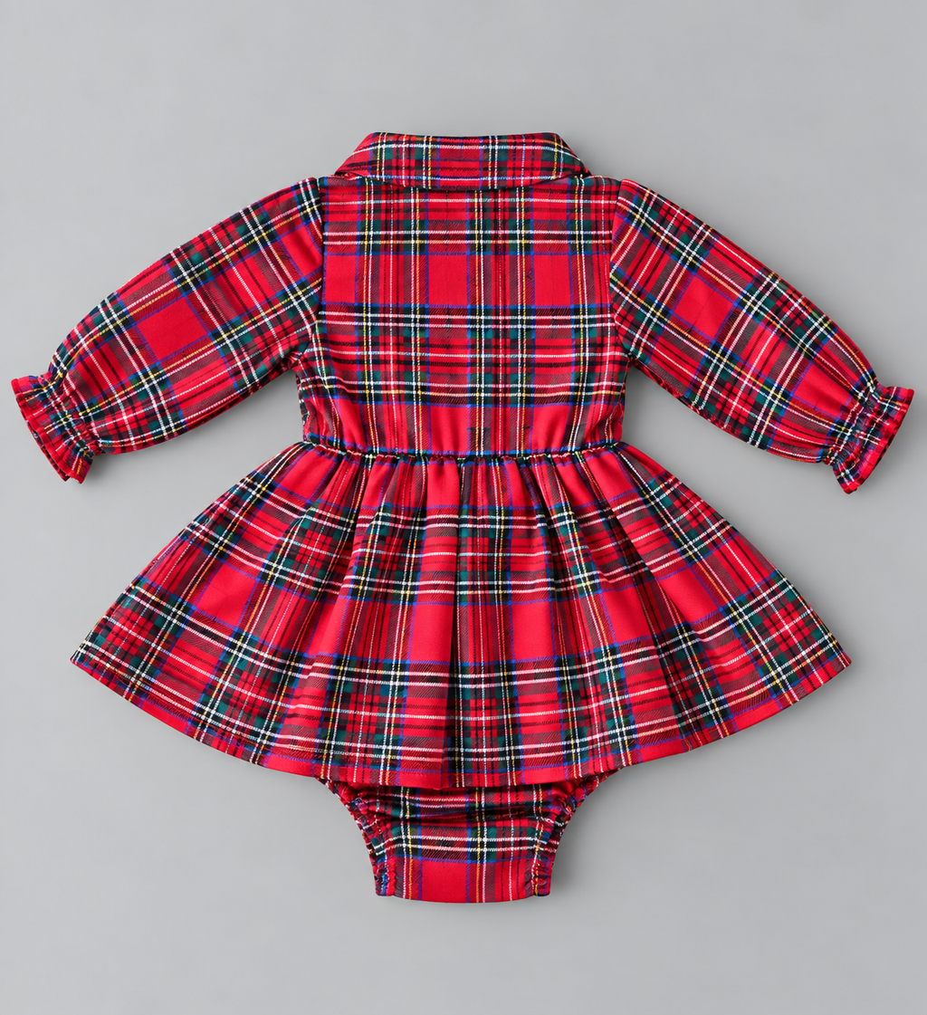 Back view of baby girl red tartan plaid long-sleeve skirted romper with gathered waist and snap bottom