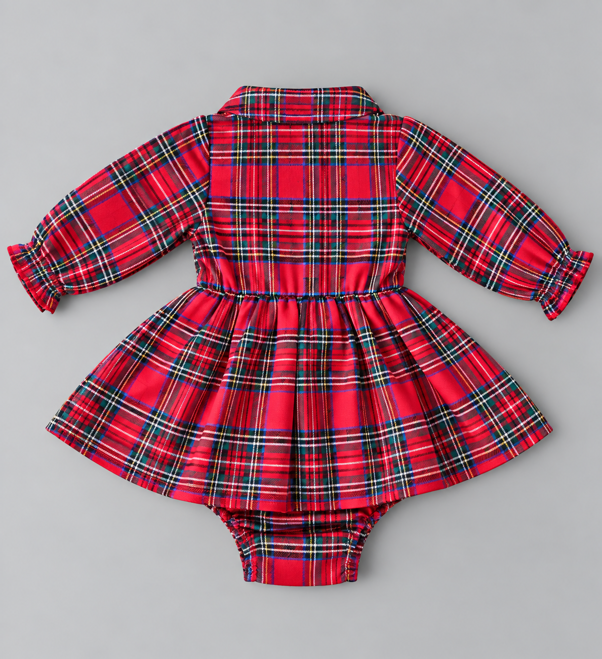 Back view of baby girl red tartan plaid long-sleeve skirted romper with gathered waist and snap bottom