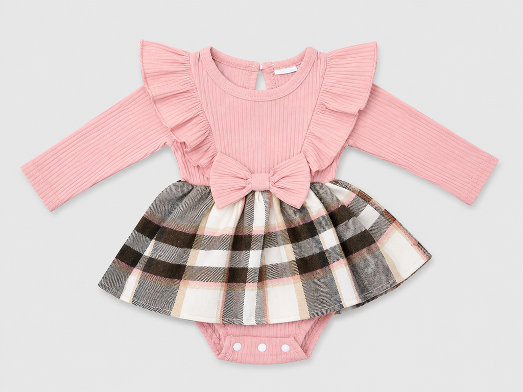 Shop the adorable Pink Plaid Bow Long Sleeve Dressy Romper featuring a ribbed pink top, ruffle details, statement bow, and attached plaid skirt for a sweet boutique-inspired look.