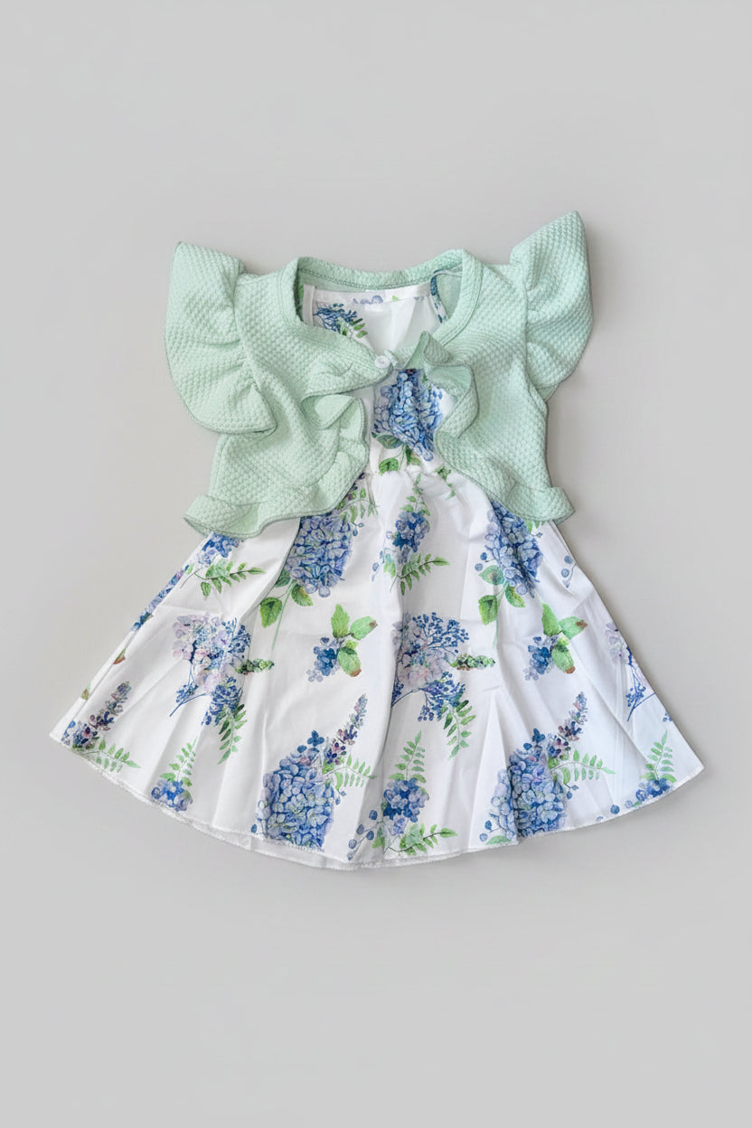 Elegant girls hydrangea floral dress with a textured mint green ruffle shrug. A boutique-style two-piece outfit perfect for Easter, weddings, birthdays, family photos, and special occasions.