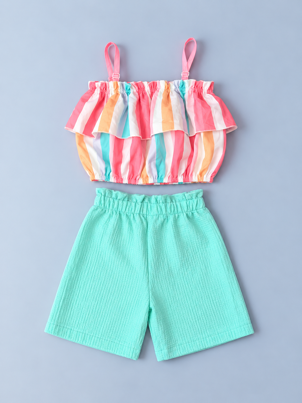 Back view of girls pastel striped ruffle top with mint green elastic-waist shorts set