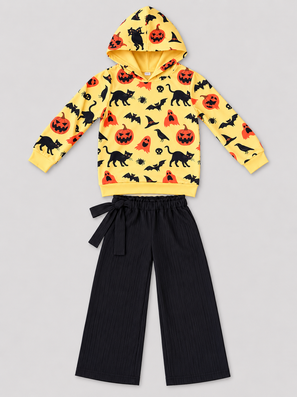 Girls yellow Halloween print hoodie and black wide-leg pants two-piece outfit, front view