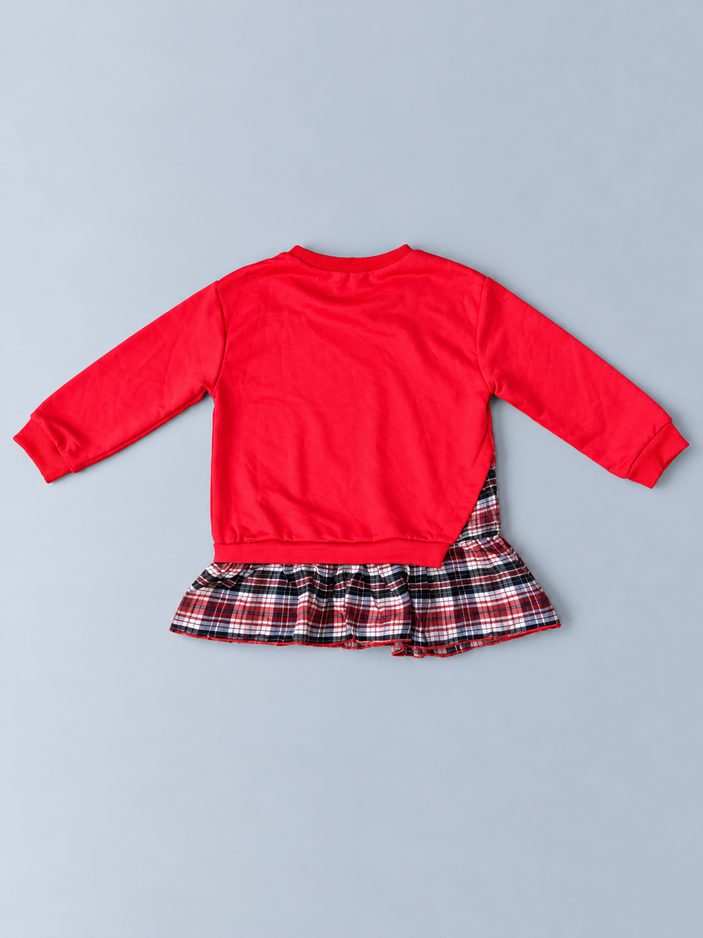 Girls red long-sleeve top with ribbed cuffs and gathered plaid ruffle hem