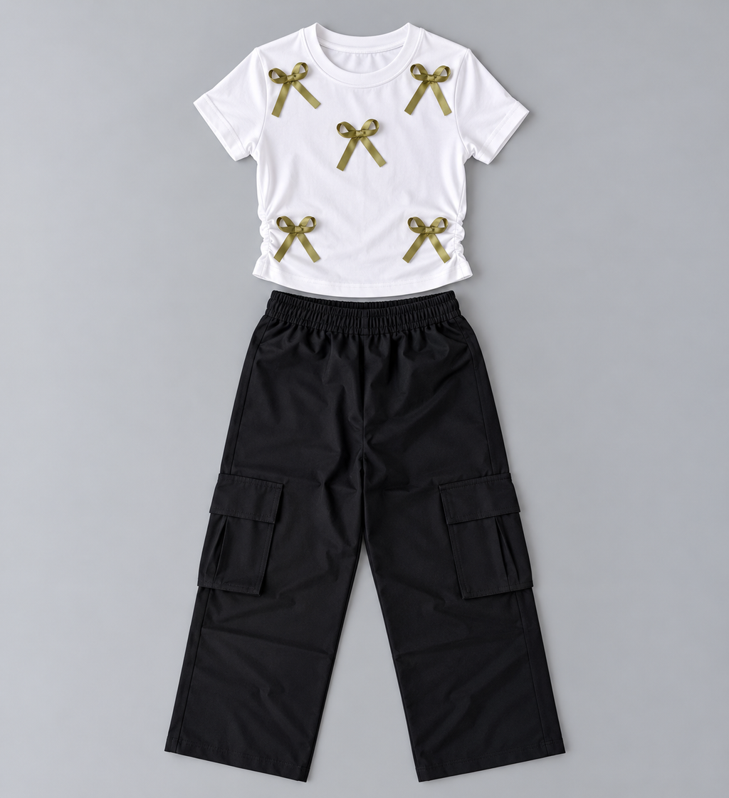 Girls white bow accent top with ruched elastic sides and black wide-leg cargo pants two-piece outfit
