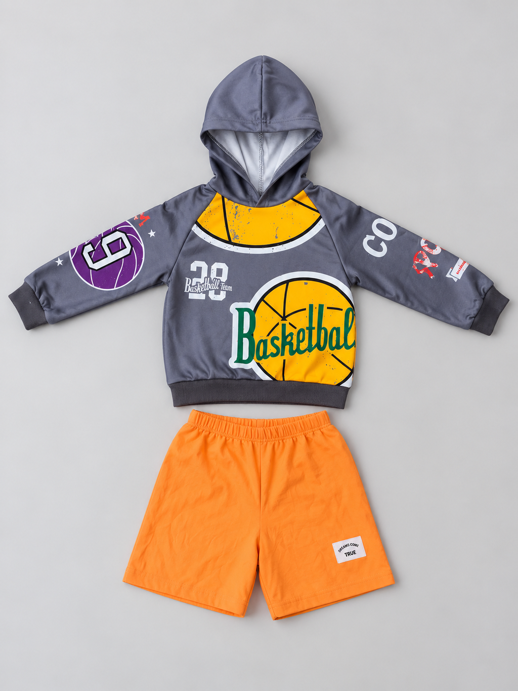 Kids gray basketball graphic hoodie and bright orange shorts two-piece outfit, front view