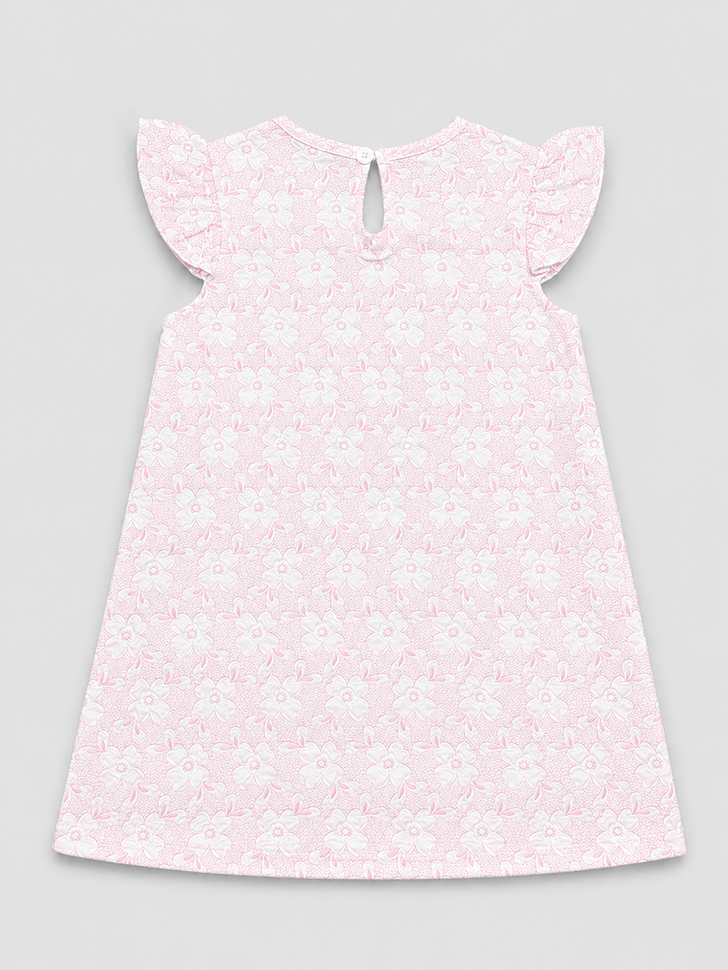 A light pink and white floral patterned dress with ruffled cap sleeves and a keyhole back closure, shown flat on a neutral gray background.