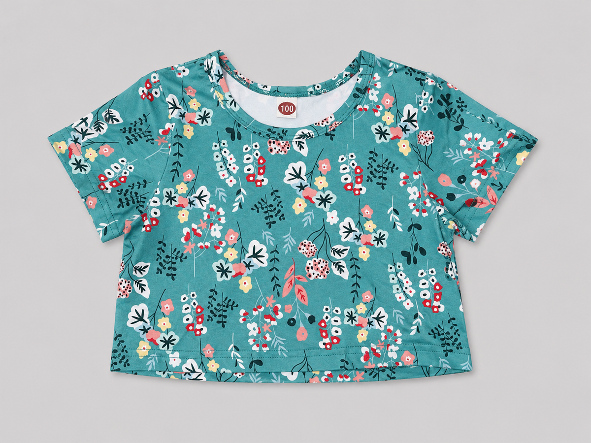 Girls' teal floral print short-sleeve top featuring a colorful botanical pattern and comfortable everyday style.  perfect for school, casual outings, spring, summer, and everyday wear.