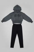 Slay All Day Hoodie & Jogger Set for girls featuring a charcoal gray cropped hooded top with bold graphic lettering and sleek black tapered pants. A trendy outfit perfect for school, casual days, lounging, and everyday wear.