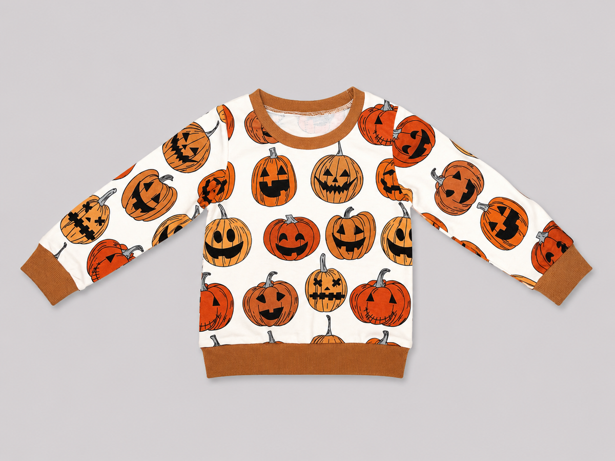 Shop the adorable Pumpkin Patch Kids Ribbed Sweatshirt featuring playful jack-o’-lanterns, cozy long sleeves, and rust-brown ribbed trim. Perfect for fall, Halloween, and pumpkin patch adventures.