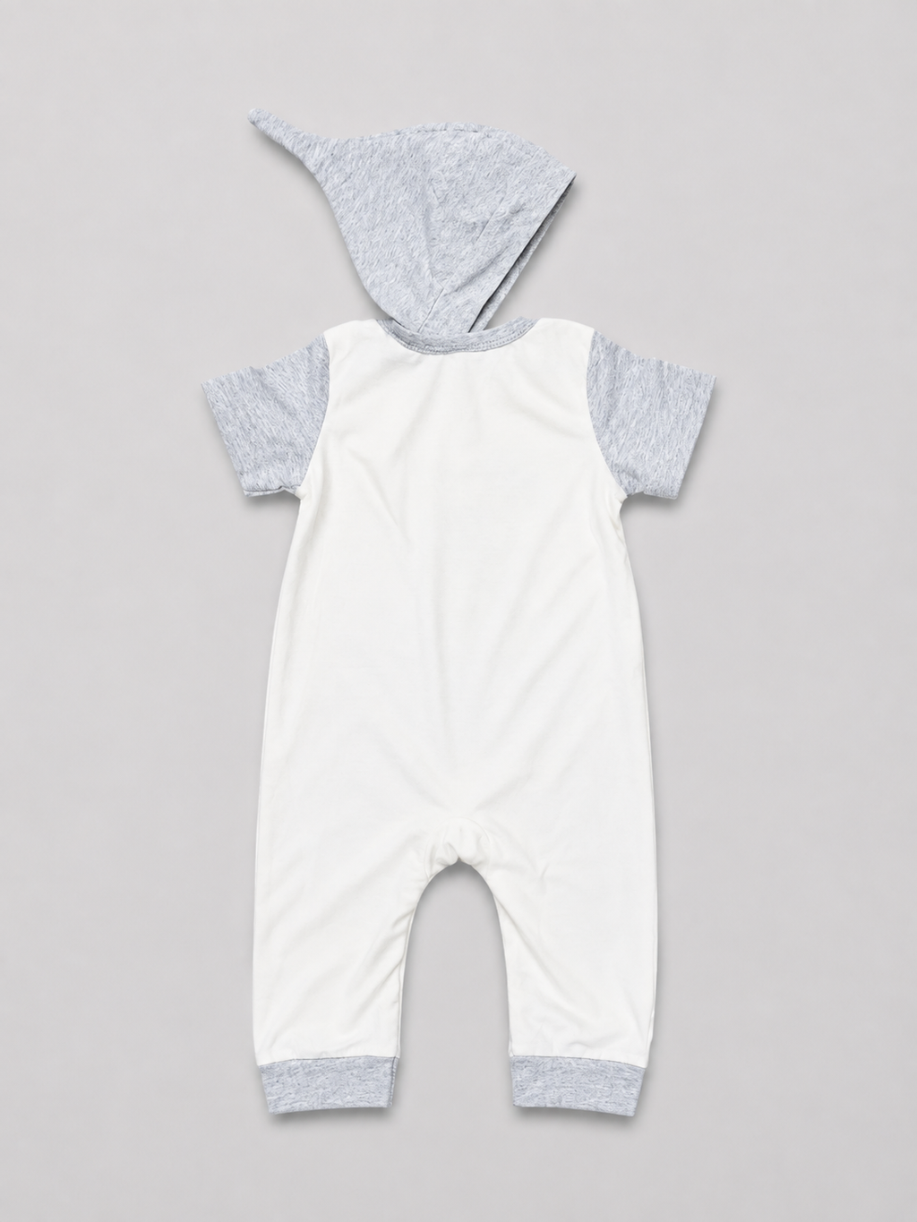 Shop this adorable baby boys' “King” elephant romper featuring a crowned elephant graphic, matching hood, gray accents, and convenient snap closures. A sweet and comfortable outfit for everyday wear, photos, or gifting.