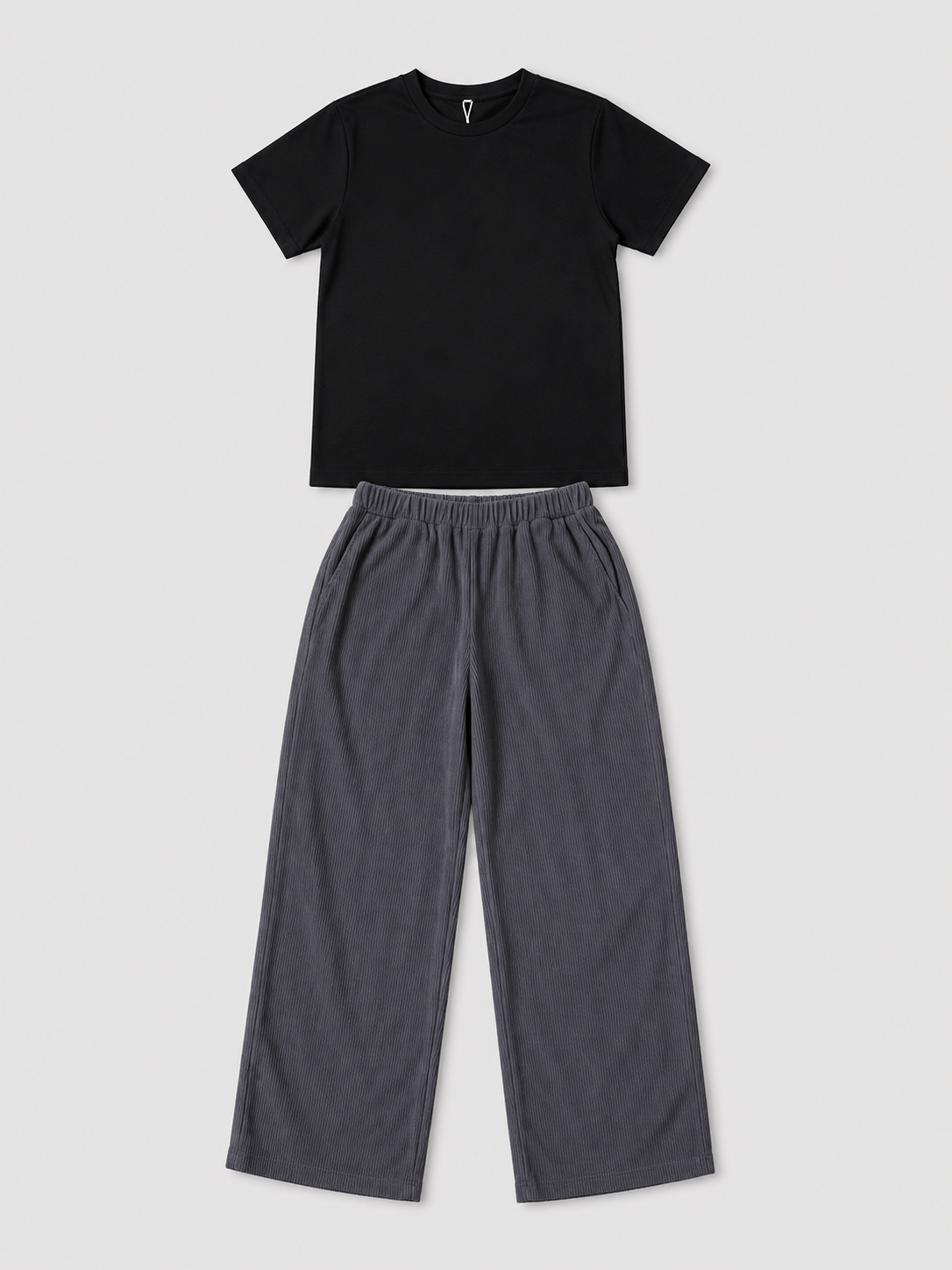 Shop the Black Tee & Charcoal Corduroy Wide-Leg Pants Set for kids. Featuring a classic black tee and relaxed charcoal textured pants with an elastic waistband for comfortable everyday wear.