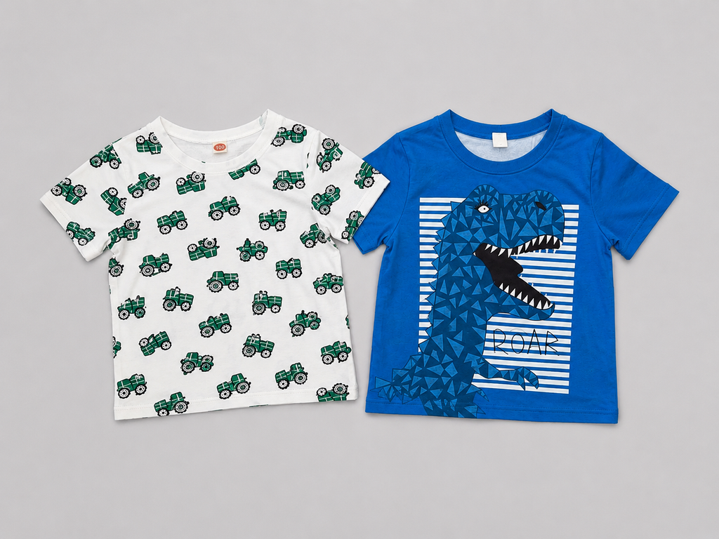 Shop this fun boys' T-shirt set featuring a green tractor print tee and a blue dinosaur “ROAR” graphic tee. Two playful short-sleeve shirts perfect for everyday wear, playtime, and adventures.