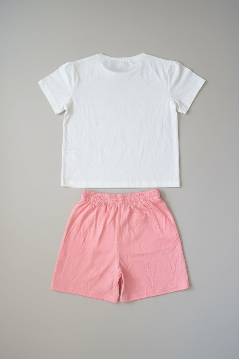 Brighten her wardrobe with this Butterfly Dreams 2-piece girls outfit featuring a colorful butterfly graphic tee and blush pink shorts. Perfect for everyday play, vacations, and summer fun.
