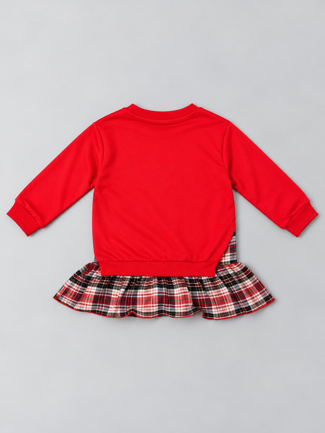 Girls red sweatshirt-style dress with gathered plaid ruffle hem, back view