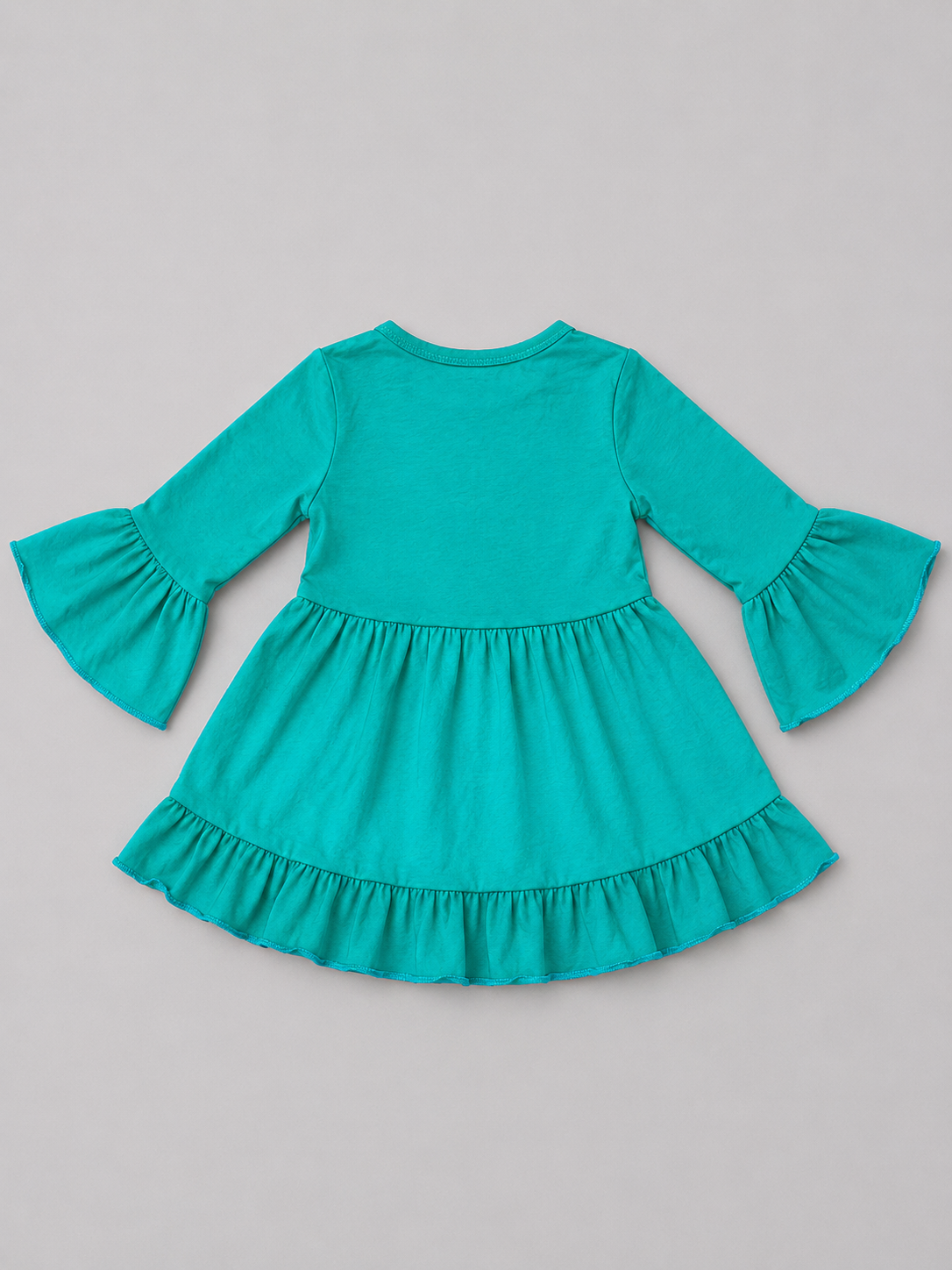Shop this adorable turquoise girls dress featuring long bell sleeves, a tiered ruffle skirt, and a fun flowing silhouette perfect for everyday wear or special occasions.