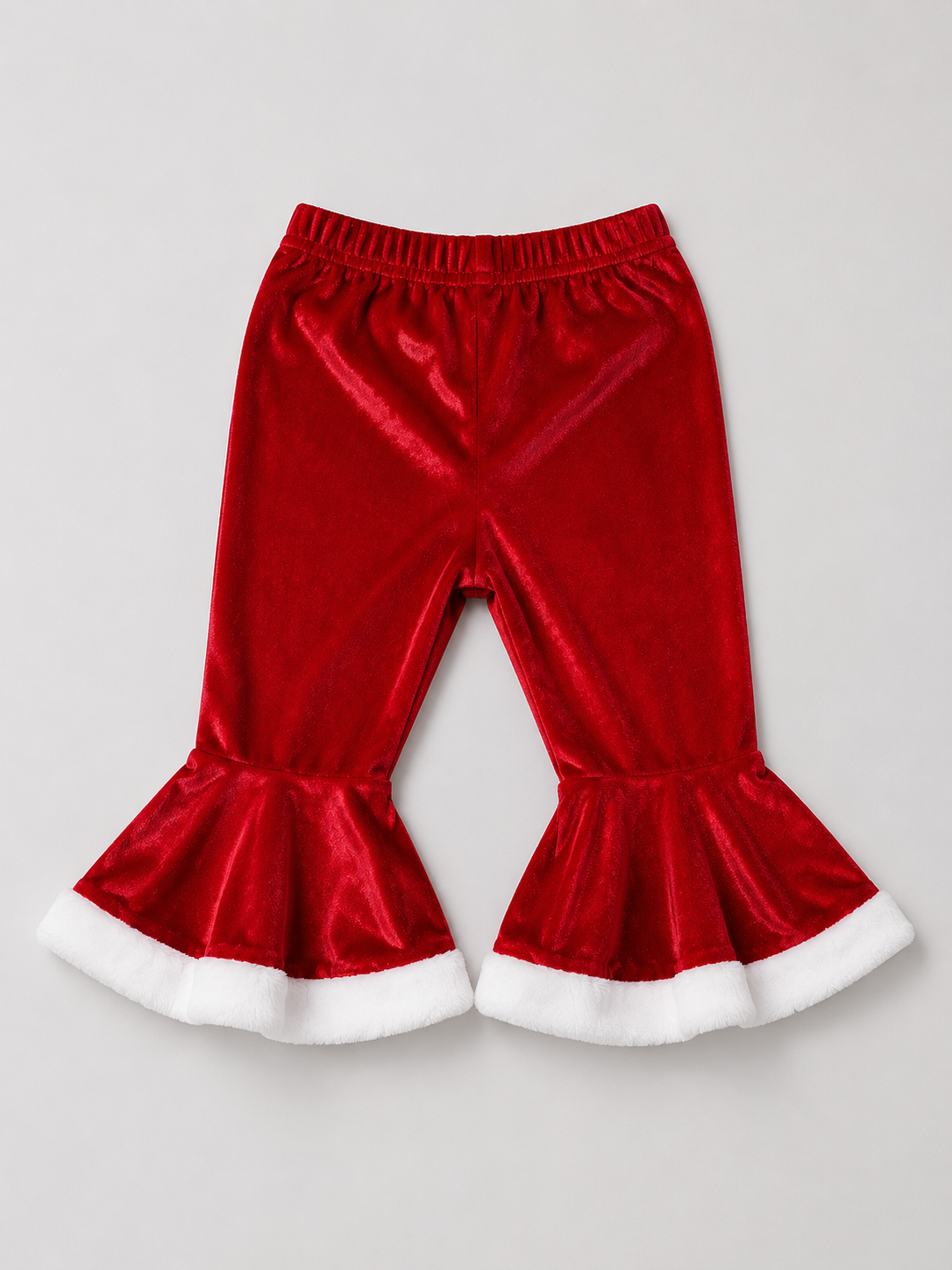 Shop these festive red and white girls Christmas pants featuring a fun bell-bottom design and fluffy white trim. Perfect for Christmas parties, holiday photos, and festive celebrations.
