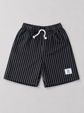 Shop these stylish black and white pinstripe kids shorts featuring an elastic waistband and adjustable drawstring. A versatile unisex style perfect for boys and girls, everyday wear, outings, and casual outfits.