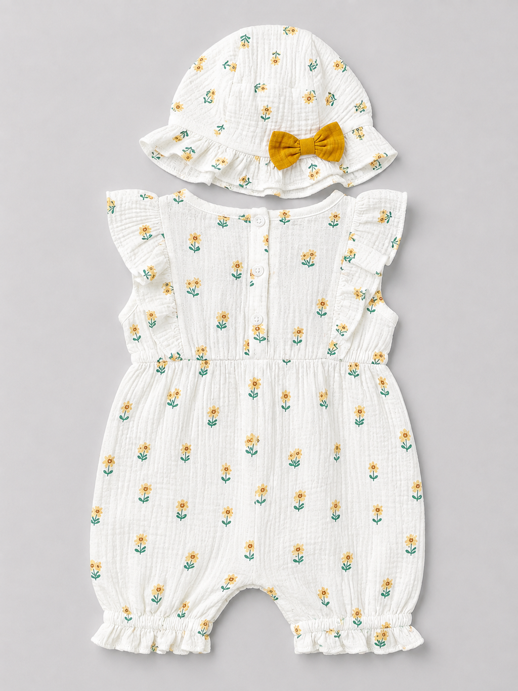 Shop this adorable baby girl sunflower romper and matching hat set featuring ruffle details, mustard-yellow bows, and a sweet floral print. Perfect for sunny days, photos, and special occasions.
