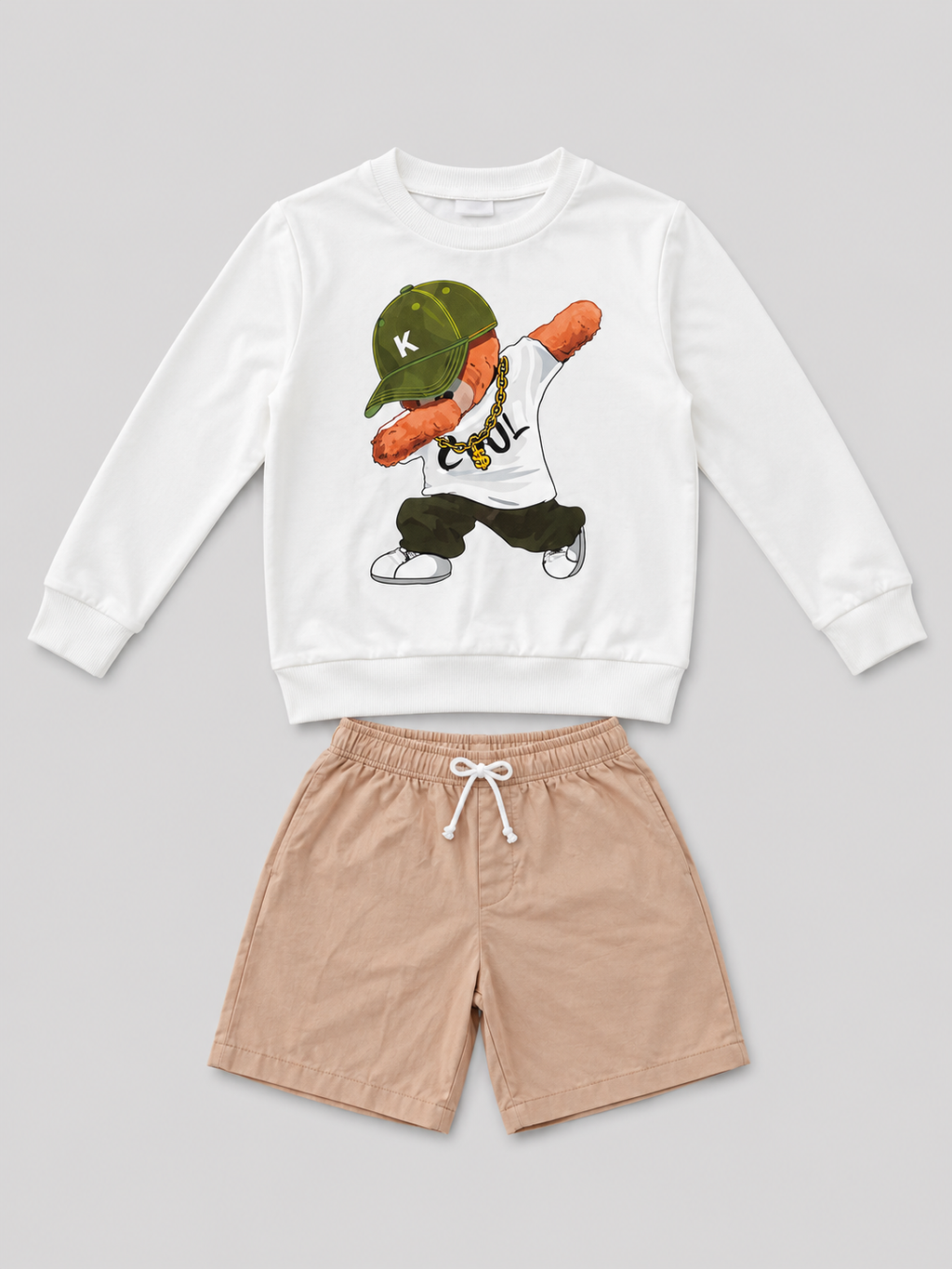 Shop this cool boys’ two-piece set featuring a white hip-hop dancer sweatshirt and tan drawstring shorts. A stylish choice for everyday wear, play, and casual outings.

