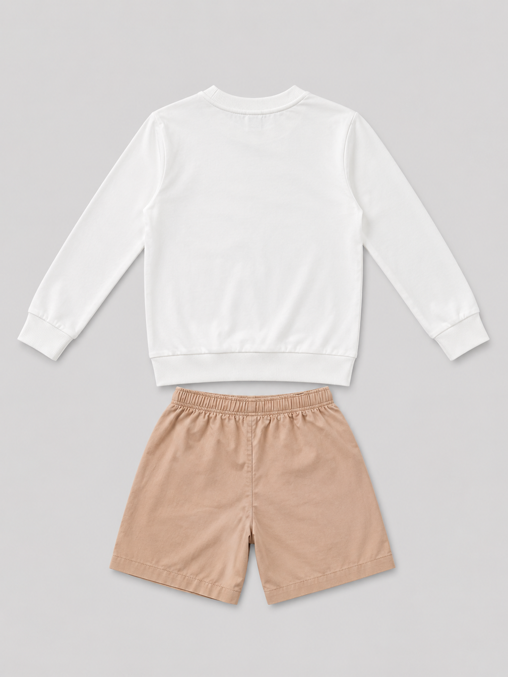 Shop this cool boys’ two-piece set featuring a white hip-hop dancer sweatshirt and tan drawstring shorts. A stylish choice for everyday wear, play, and casual outings.

