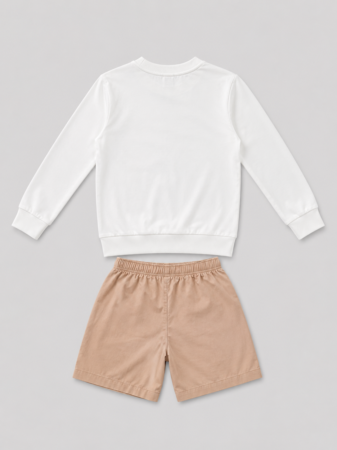 Shop this cool boys’ two-piece set featuring a white hip-hop dancer sweatshirt and tan drawstring shorts. A stylish choice for everyday wear, play, and casual outings.

