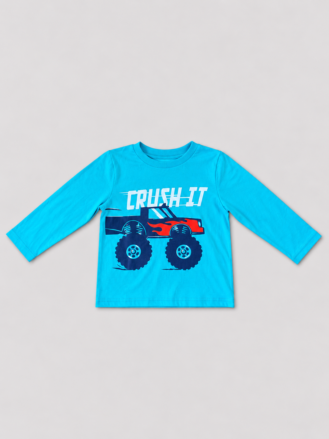 Boys 5Y turquoise long-sleeve shirt with Crush It monster truck graphic in navy, red, and white, front view.