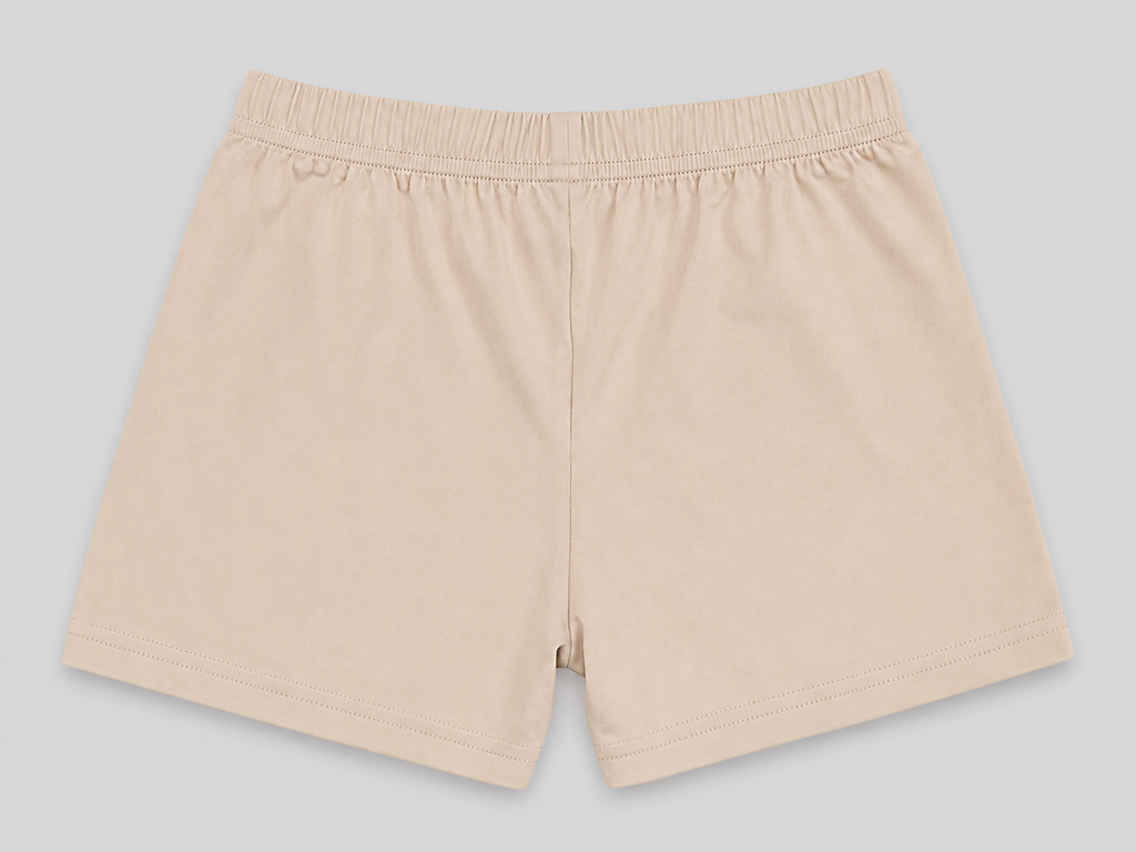 A pair of light beige elastic-waist shorts laid flat against a neutral gray background.
