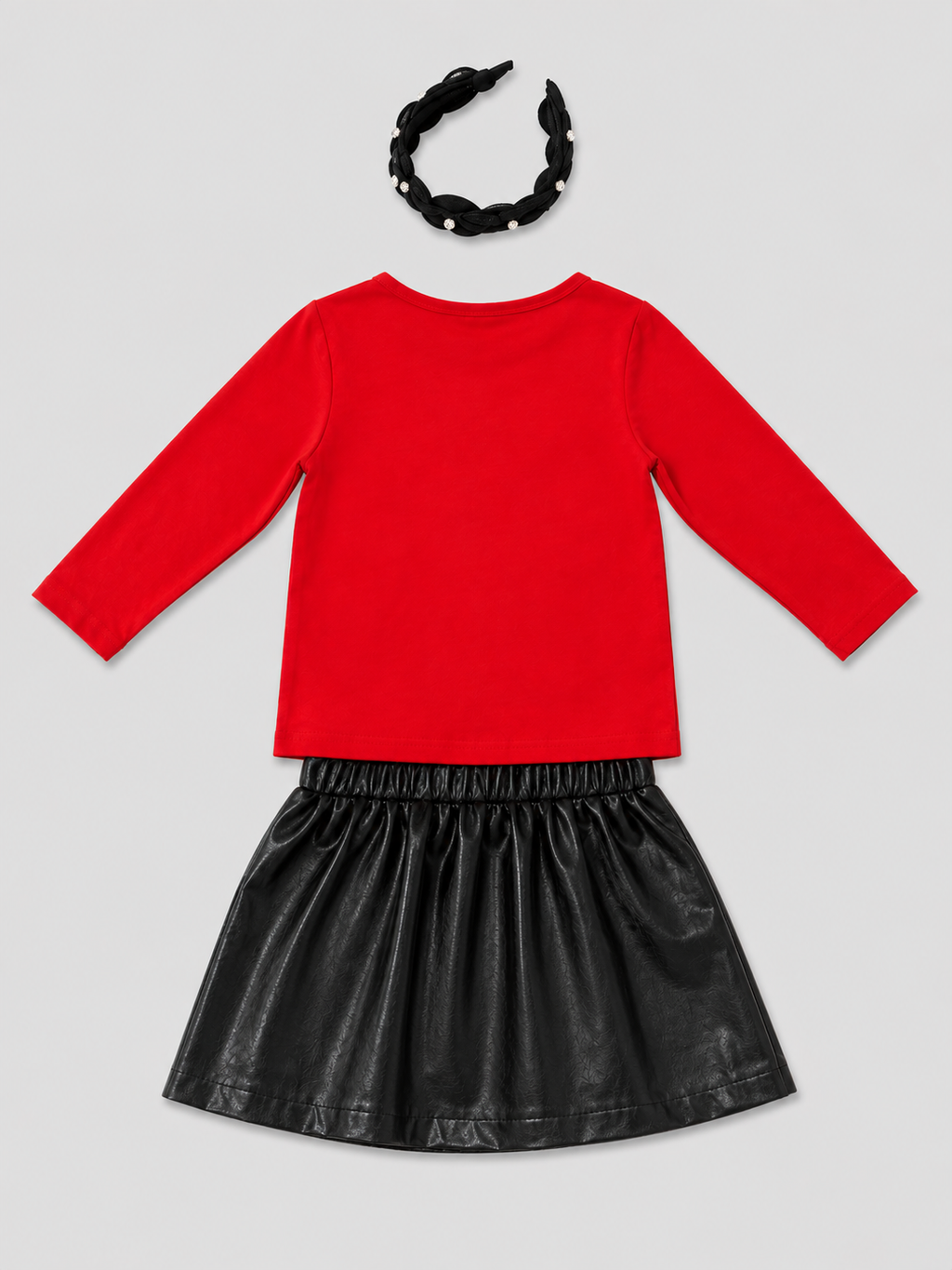 Shop this adorable 3-piece girls Christmas outfit set featuring a festive red reindeer top, black faux leather skirt, and embellished pearl headband. Perfect for holiday parties and Christmas photos!