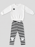 Girls white textured sweatshirt and black-and-white striped heart pants two-piece set, front view, size 4–5Y.