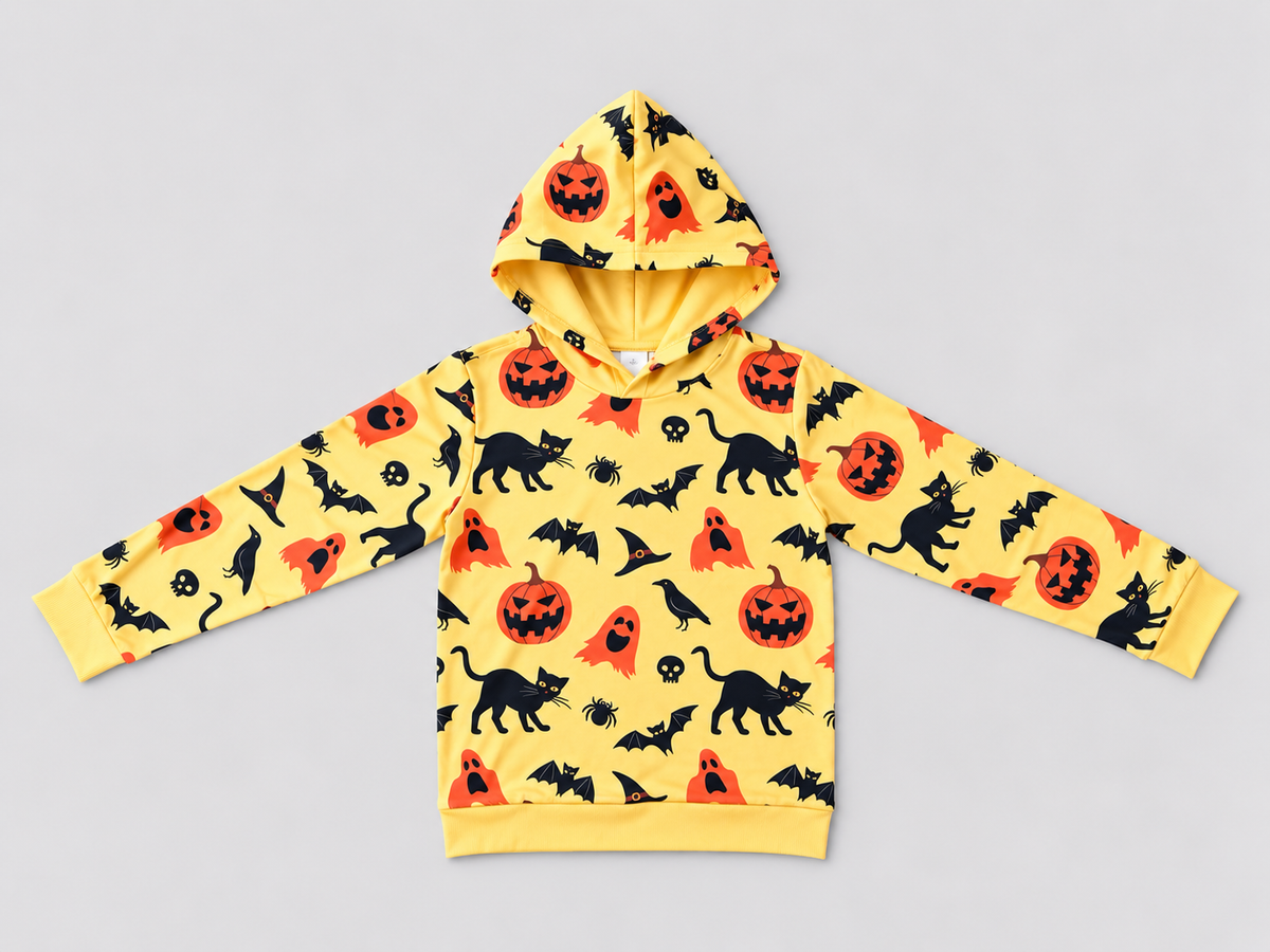 Girls yellow Halloween hoodie with pumpkins, black cats, ghosts, bats, and witch hats, front view