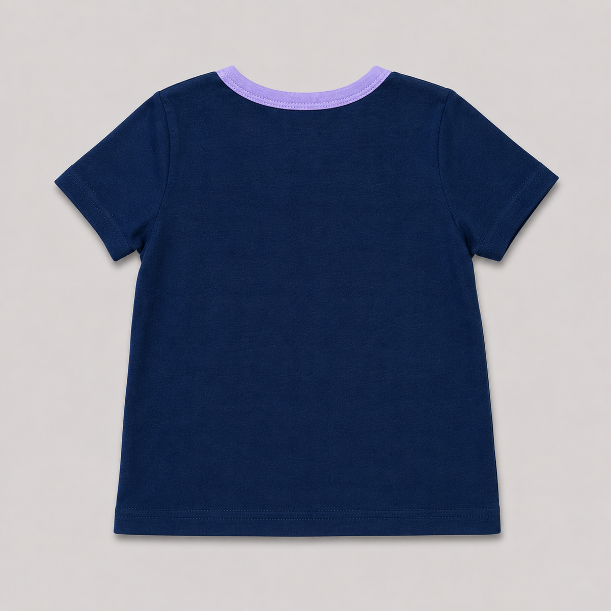 Shop this adorable navy and lavender girls T-shirt featuring a sweet cloud, pink bow, rainbow details, and stars. A fun and versatile short-sleeve top for everyday wear.