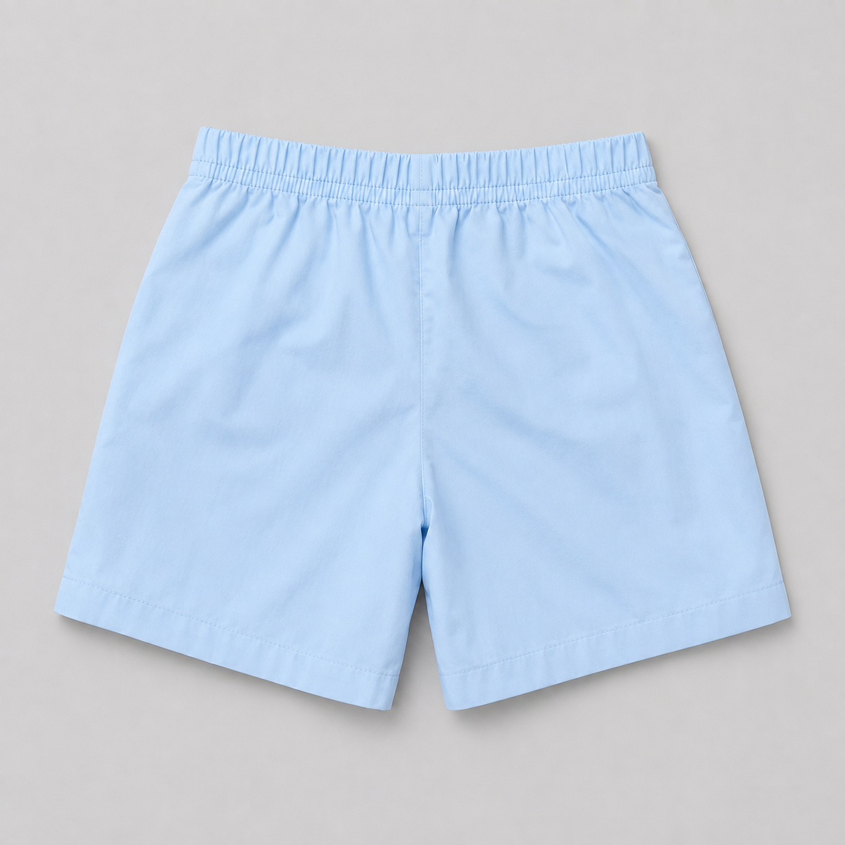 Shop these classic light blue kids' shorts featuring an elastic waistband and white drawstring. A comfortable and versatile everyday style perfect for boys or girls.