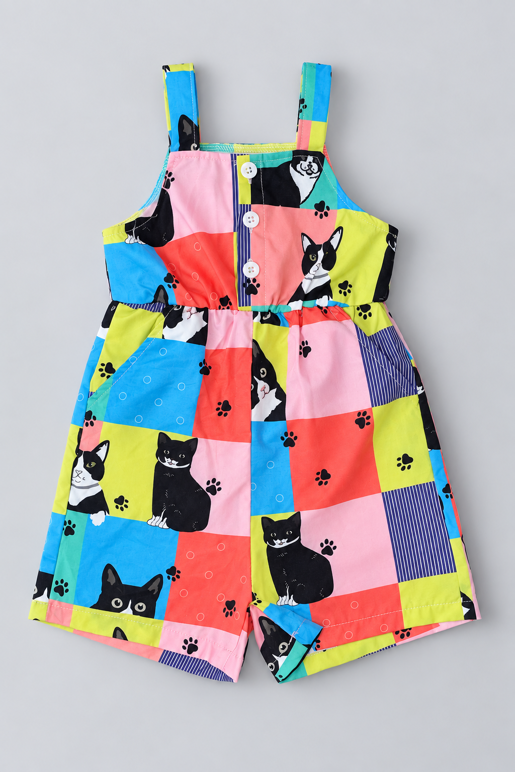 Colorful baby sleeveless romper with patchwork cat and paw print design, square neckline and front buttons