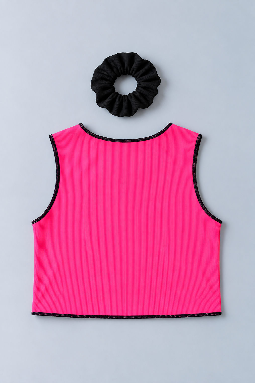 Shop this fun pink, white, and zebra print girls tank top featuring a ribbed texture and stylish color-blocked design. Perfect for warm-weather outfits and everyday wear. Comes with a black scrunchie.