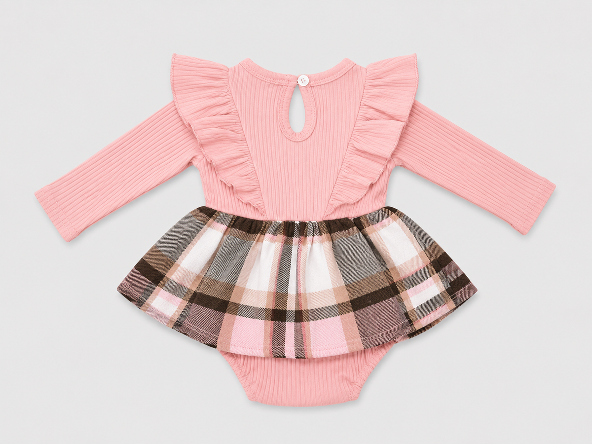 Shop the adorable Pink Plaid Bow Long Sleeve Dressy Romper featuring a ribbed pink top, ruffle details, statement bow, and attached plaid skirt for a sweet boutique-inspired look.