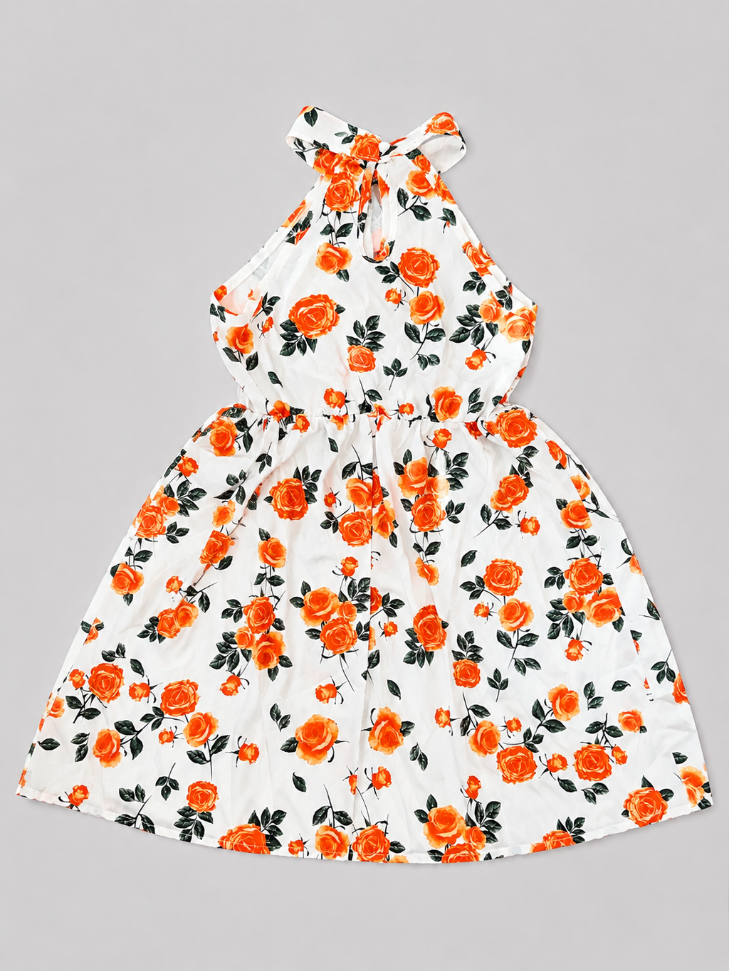 Girls' white halter dress with vibrant orange floral print. Lightweight, breathable, and perfect for birthdays, vacations, weddings, family photos, and summer celebrations.