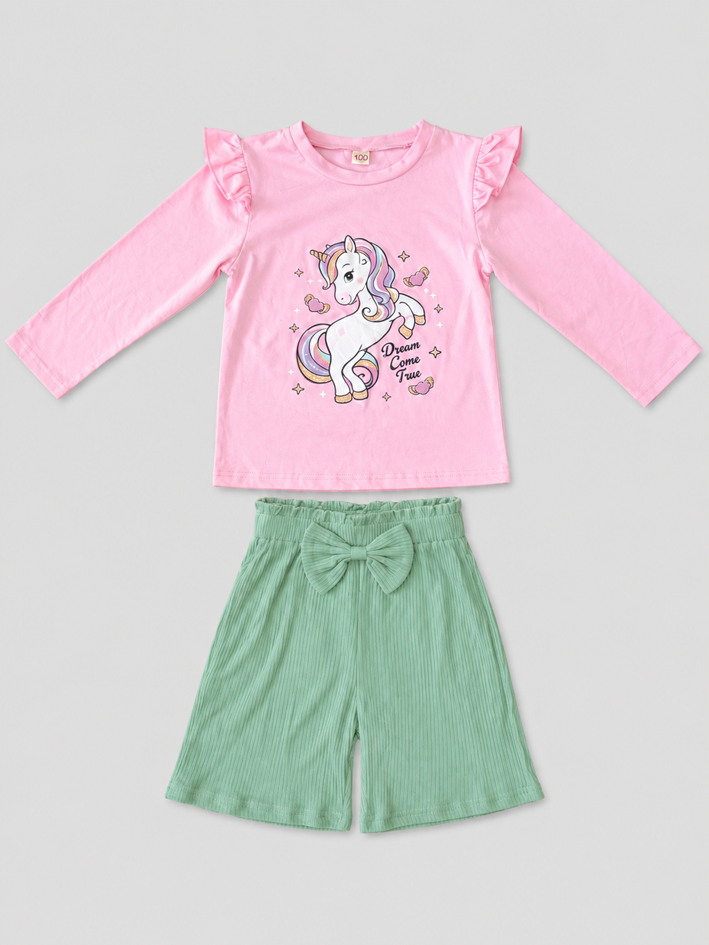 Shop this adorable girls’ unicorn 2-piece outfit featuring a pink long-sleeve top with a colorful unicorn graphic and coordinating mint green bow shorts. Perfect for everyday wear and special occasions.