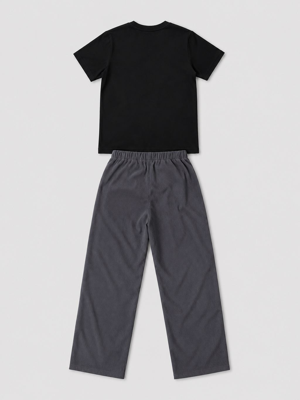 Shop the Black Tee & Charcoal Corduroy Wide-Leg Pants Set for kids. Featuring a classic black tee and relaxed charcoal textured pants with an elastic waistband for comfortable everyday wear.