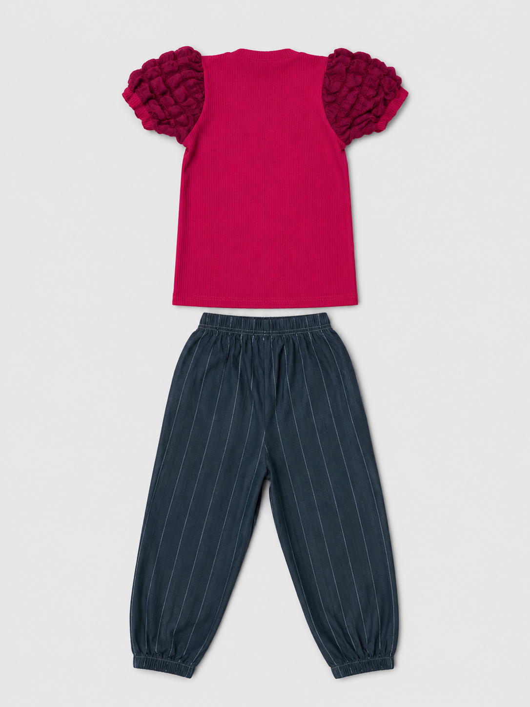 Shop the adorable Berry Pink Ruffle Sleeve Top & Pinstripe Jogger Set for girls. Featuring a textured ruffle-sleeve top and comfortable charcoal pinstripe jogger pants.